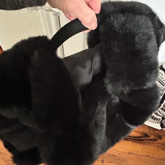 Beautiful NEW black faux fur Michael Kors Vest.Sized XXS, fits like a small.